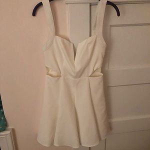 white dress withe triangle side cut outs